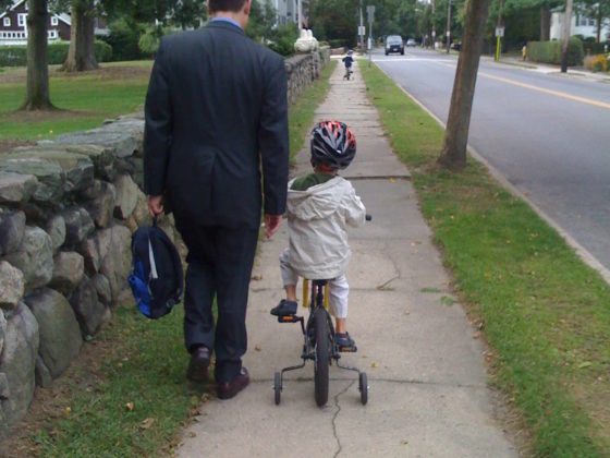 Walk to school or work to reduce your carbon footprint.